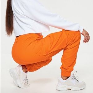 Bright orange cargo pants/sweats